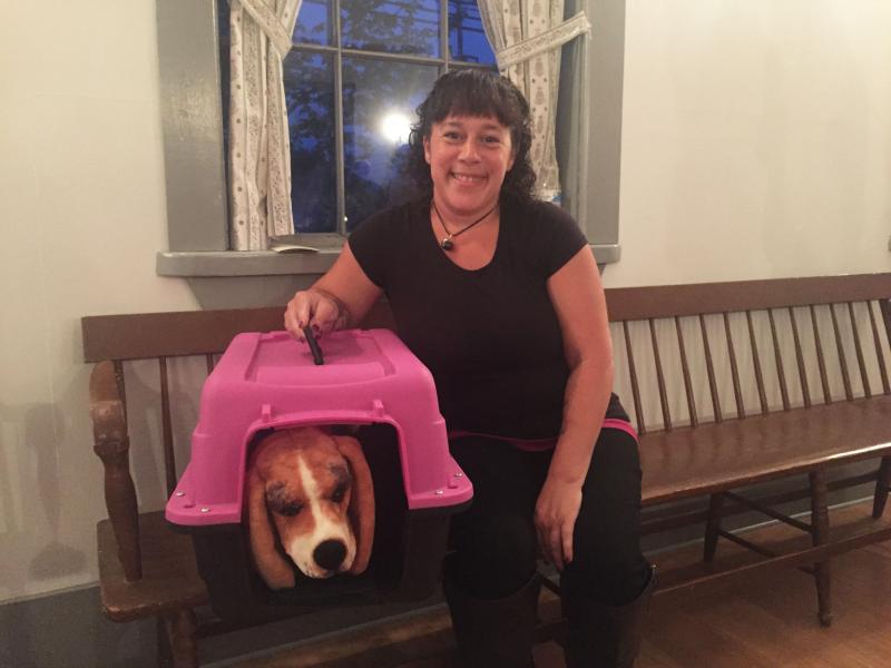 Julie Lapine brought her stuffed dog to help her investigate. The dog is said to light up if a ghost is near it. BY LYDIA GOERNER