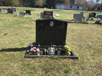 Kimberly Young has long maintained her daughter Katelynn Lake’s grave with a border. She put in the border around the headstone at the suggestion of a maintenance worker to protect the stone from the mower. Photo courtesy: Kimberly Young