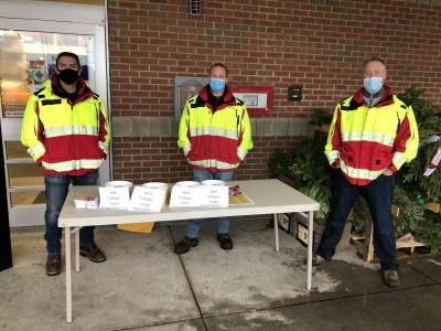 Members of the Wareham Fire Department collected donations of non-perishable goods and money during their annual food drive to benefit Turning Point. From left to right: Tom Harrigan, Chris McIntosh and Chris Smith. Photo by: Madison Czopek