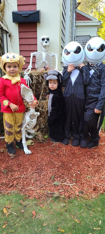 Rachel Baptista said her four sons “love Halloween, houses that really decorate and the movie Nightmare Before Christmas.” From left: Tiberius, 3, dressed as Daniel Tiger; Barron, 1, dressed as a gorilla; Maximus, 5, dressed as Jack Skellington; and Vincent, 6, dressed as Jack Skellington. Photo courtesy: Rachel Baptista