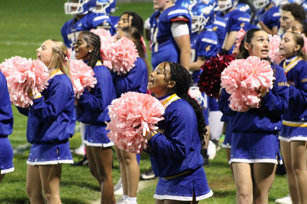 The cheer team keep spirits high. The cheer team keep spirits high.