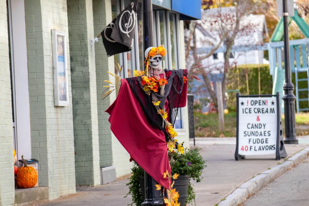 Near the Onset Bay Association's building on Onset Avenue sits this flowery skeleton scarecrow. Photos by Bobby Grady none