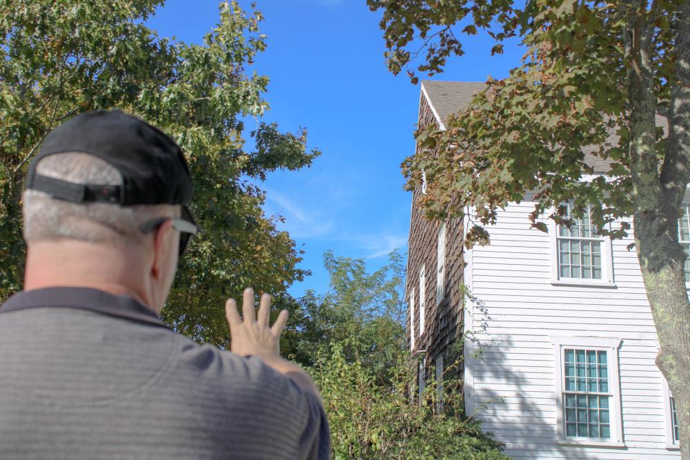 Carlston Wood stands outside of the famously haunted Fearing Tavern. Photo by Brandy Muz Carlston Wood stands outside of the famously haunted Fearing Tavern. Photo by Brandy Muz