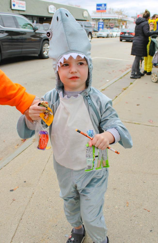 Jaws comes to Main Street as William Gropman dresses as a shark. Jaws comes to Main Street as William Gropman dresses as a shark.