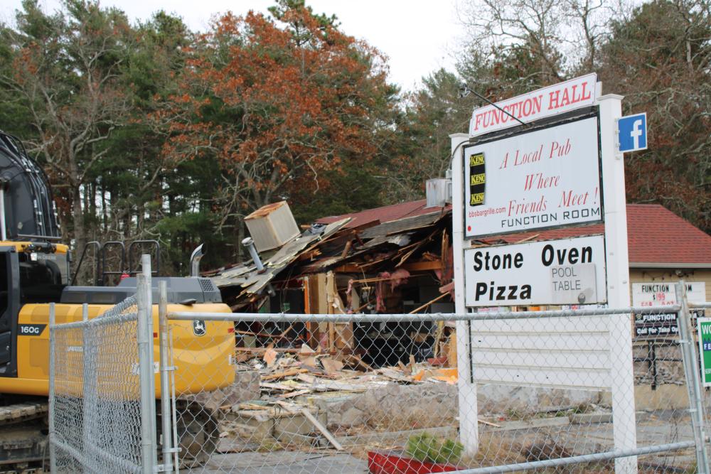 The sign for BB's Bar and Grille still stands during demolition. Photos by Brandy Muz