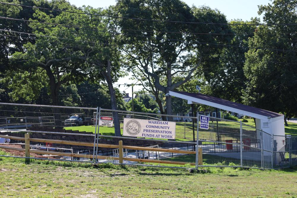 Barriers at the Onset Bandshell at 8:45 a.m. on Wednesday, Aug. 5, which are expected to be taken town later in the day. Photo by Nick Mossman