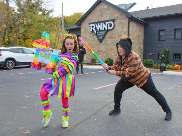 Cade Mae Pearson's costume is a smash hit as her mom tries to get some candy.