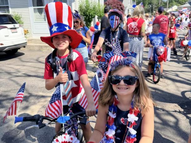Residents ride through Swifts Beach for the annual Swifts Beach Improvement Association Fourth of July parade. Source: Christy Patalano