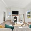 Pellet stove on a shiplap wall in the living room of 226 Sanford Road, Westport, MA