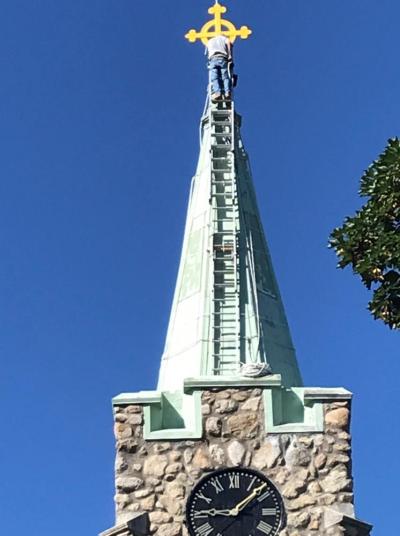 Gold leafing is done to the cross. Photo source: Church of the Good Shepherd