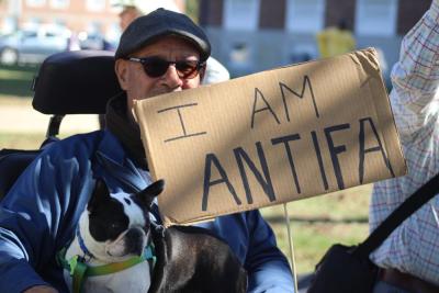 John Barboza and his protesting dog Nora.