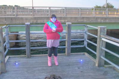 Ainslee Manduca stands proud with her lights.