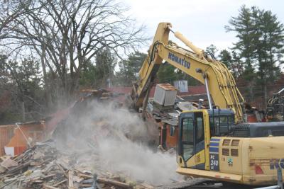 Dust settles on the tear down.