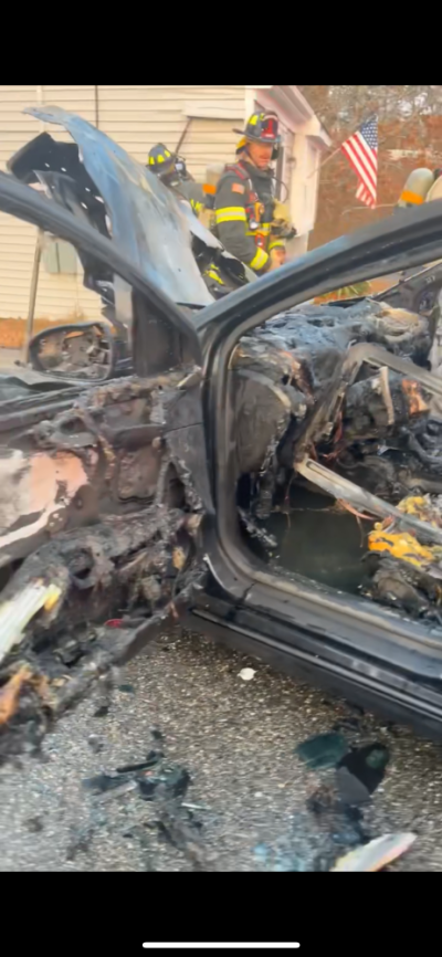 The car after the fire was extinguished. Photo Source: Lexi McCarthy