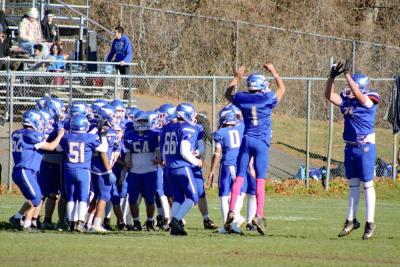Two players celebrate before the game.