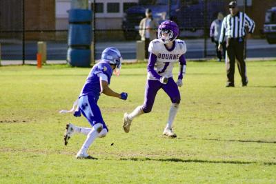 Jayden Medeiros makes a push for the endzone.