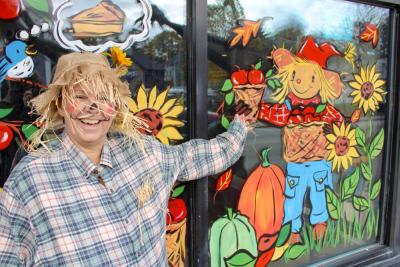 Leslie Durling outside of the cafe on Halloween. Photo by Brandy Muz