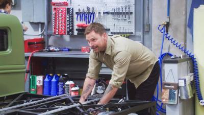 Seann William Scott works on the Factory Five truck. Photo source: ABC
