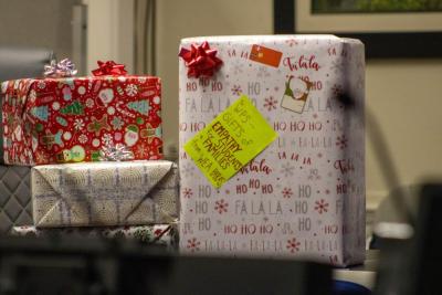 The various presents sat around the room during the meeting.