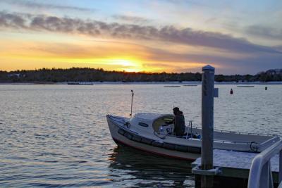 Stuart Downie boats away on the chilly bay.