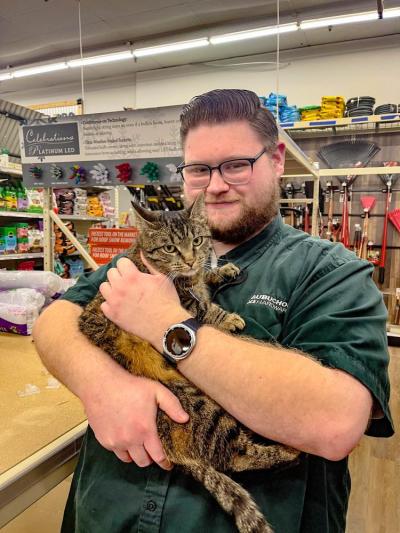 Manager Dan Carneiro and Cinder, best friends fur-ever. Photos by Brandy Muz