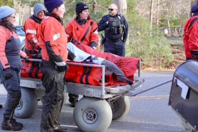 The dolphins were loaded onto a soft mat and transported by a team from International Fund for Animal Welfare. Photos by Brandy Muz