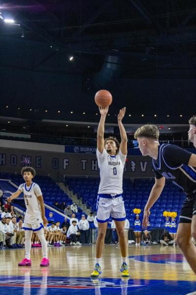Amare Rose goes for the free-throw.