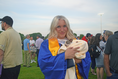 McKenna Duggan with her family's puppy. 