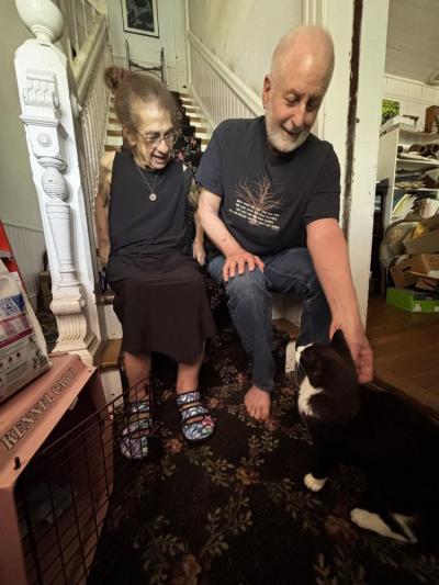 Moochi and her owners. Source: Jessica Bell