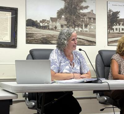 Superintendent Amy Hartley-Matteson reports to the School Committee. Photo by Christian Uva