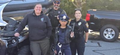 Genasis Gumbs wants to be a police officer one day like her grandfather, Sergeant Nick Fernandes. Photo source: Gena Gumbs