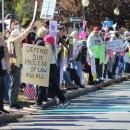 Wareham for Law and Democracy had people directing traffic to allow cars and people to safely move. 