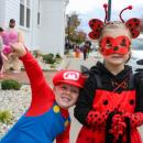 Clayton and Genevieve Schmoker gather candy in style.