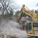 Dust settles on the tear down.