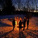 The group gathers around the fire. Photos by Brandy Muz