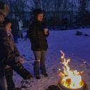The Roux family gathers for s'mores.