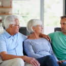 Parents talking to their son. 