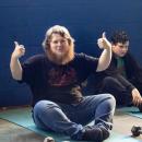 Tyler Maclver stretching before weightlifting. Photos by Brandy Muz