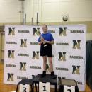 Quinn Perry and her big first place trophy. 