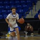 Moving fast, Amare Rose makes his way to the net.