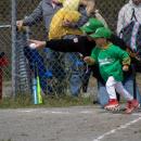 A player on the Dance Innovations VIP Teeball team bolts for first plate. Photos by Brandy Muz