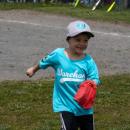 A Webb Plumbing player goes for the ball in the out field. 