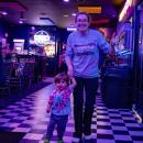 Danny Craig and his mom Brandy boogie down to the arcade. 