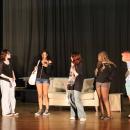The cast prepares for opening night by rehearsing scenes.