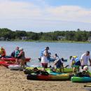 Kayakers get in their boats