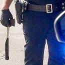 The ax being carried by a police officer. 