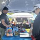Children learn about fire safety with illustrated books.