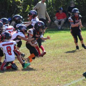 Winter Austin evades a tackle. Photos by Brandy Muz