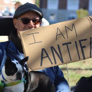 John Barboza and his protesting dog Nora.