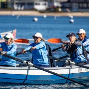 Dharma Voyage rowers get the race started in the "Spirit of Westport." none